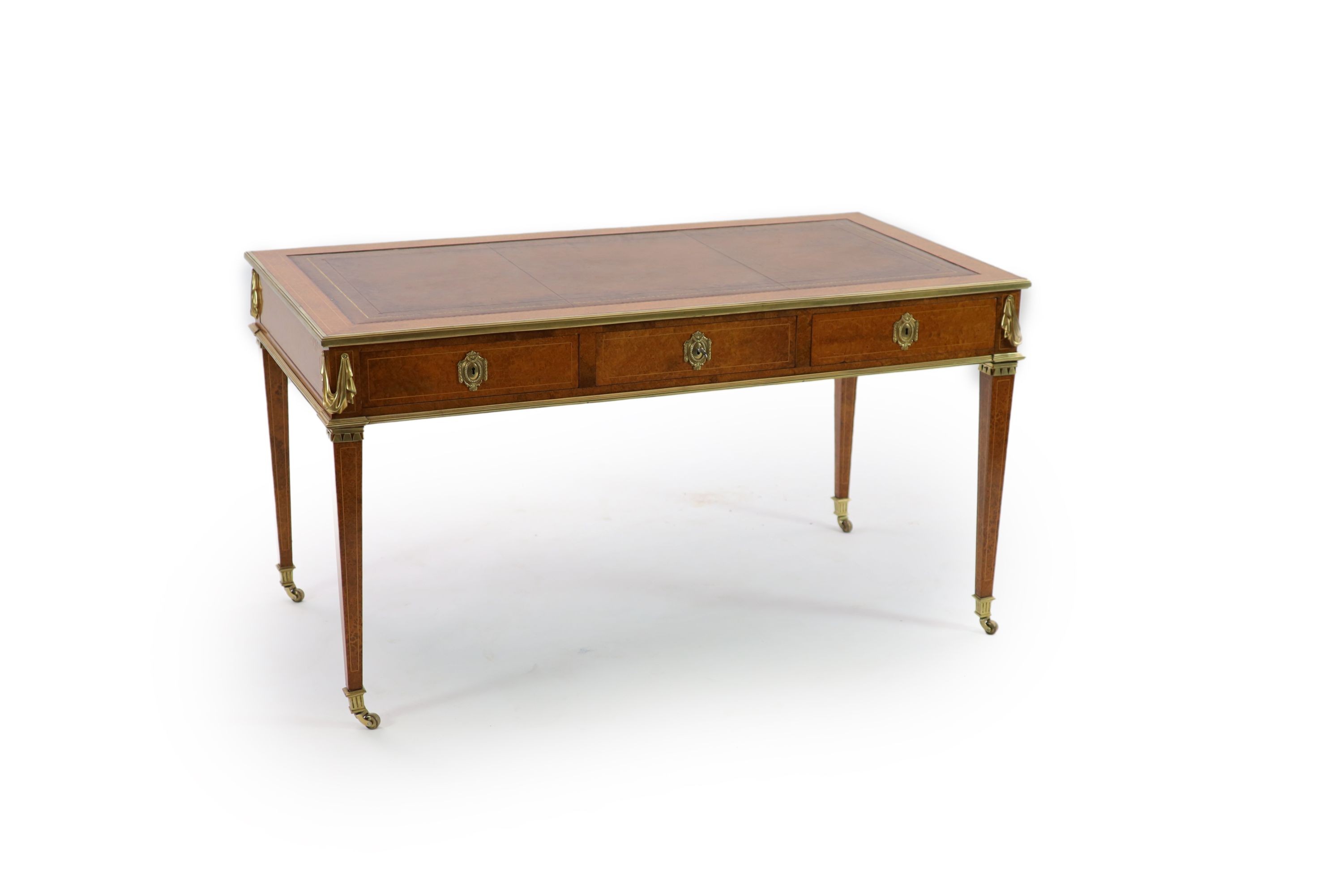 Laporte Barmen. A Louis XVI style ormolu mounted burr wood bureau plat, W.142cm D.76cm H.77cm